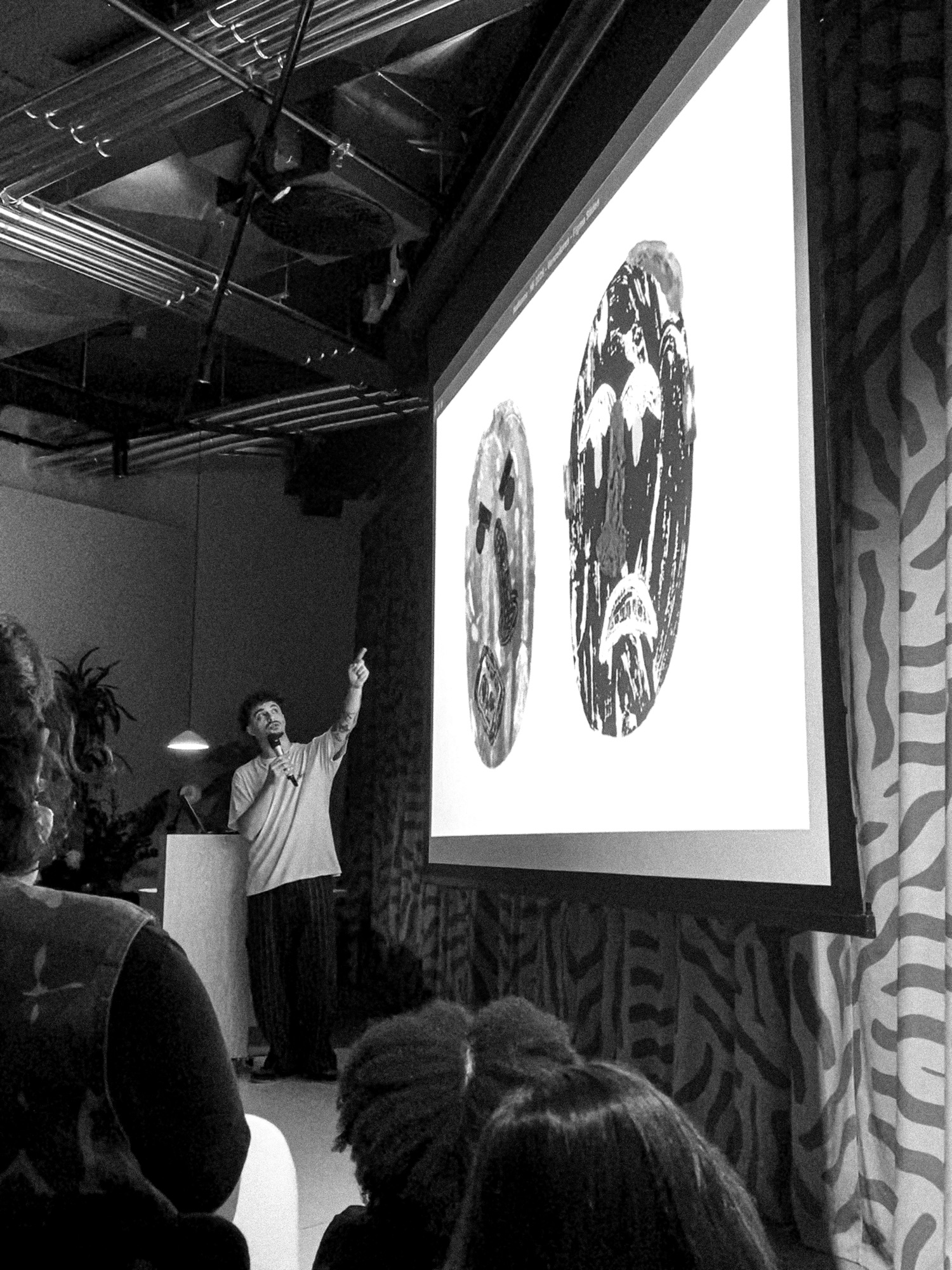 Diogo presenting at a talk